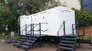 luxury porta potty trailer in a park